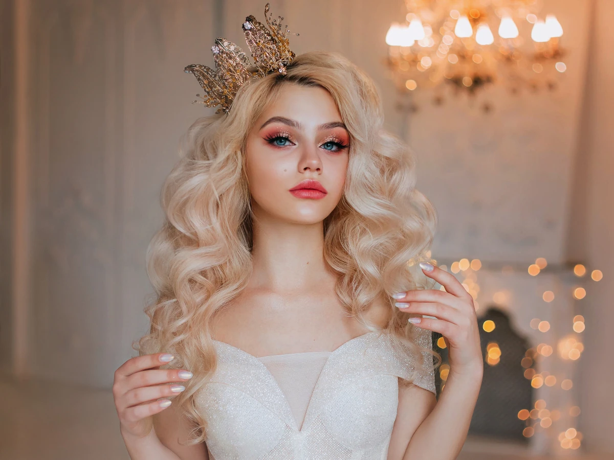 Attractive woman in white lingerie is roleplaying a princess