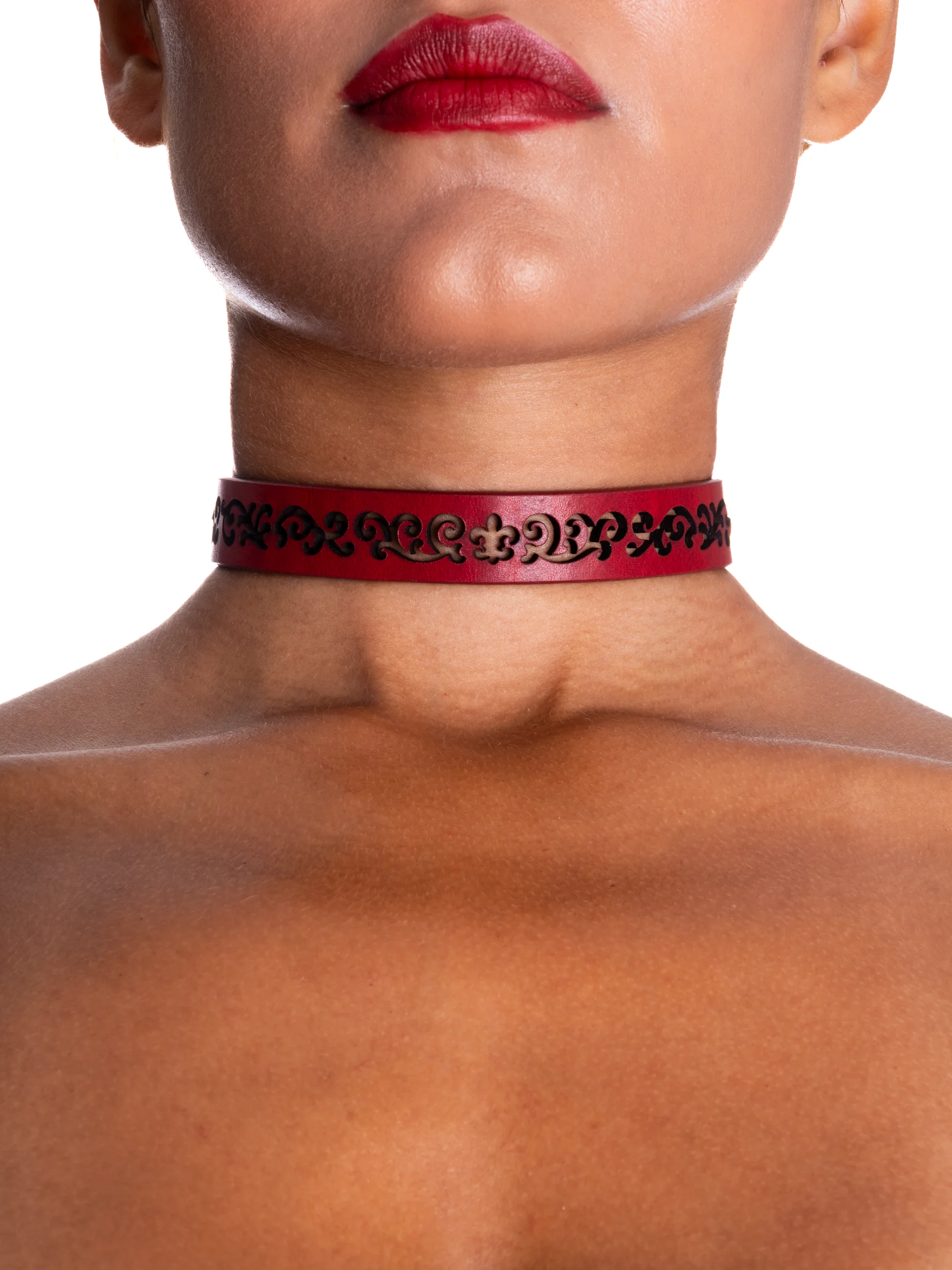 Woman wearing a gothic choker with a pattern cut out